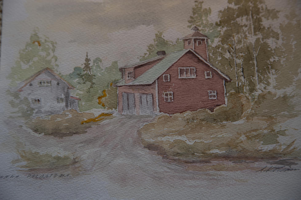 Aarno Kettunen tallensi akvarelleihinsa Parikkalan vanhoja rakennuksia. Tässä vanha paloasema. 